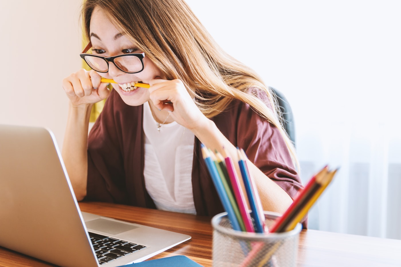 A student studying at a laptop