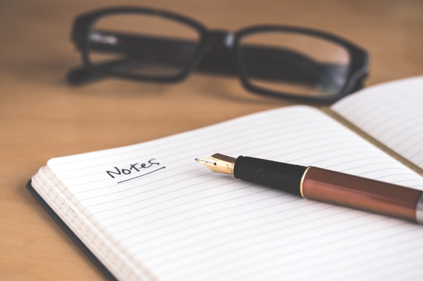 An open notebook and pen