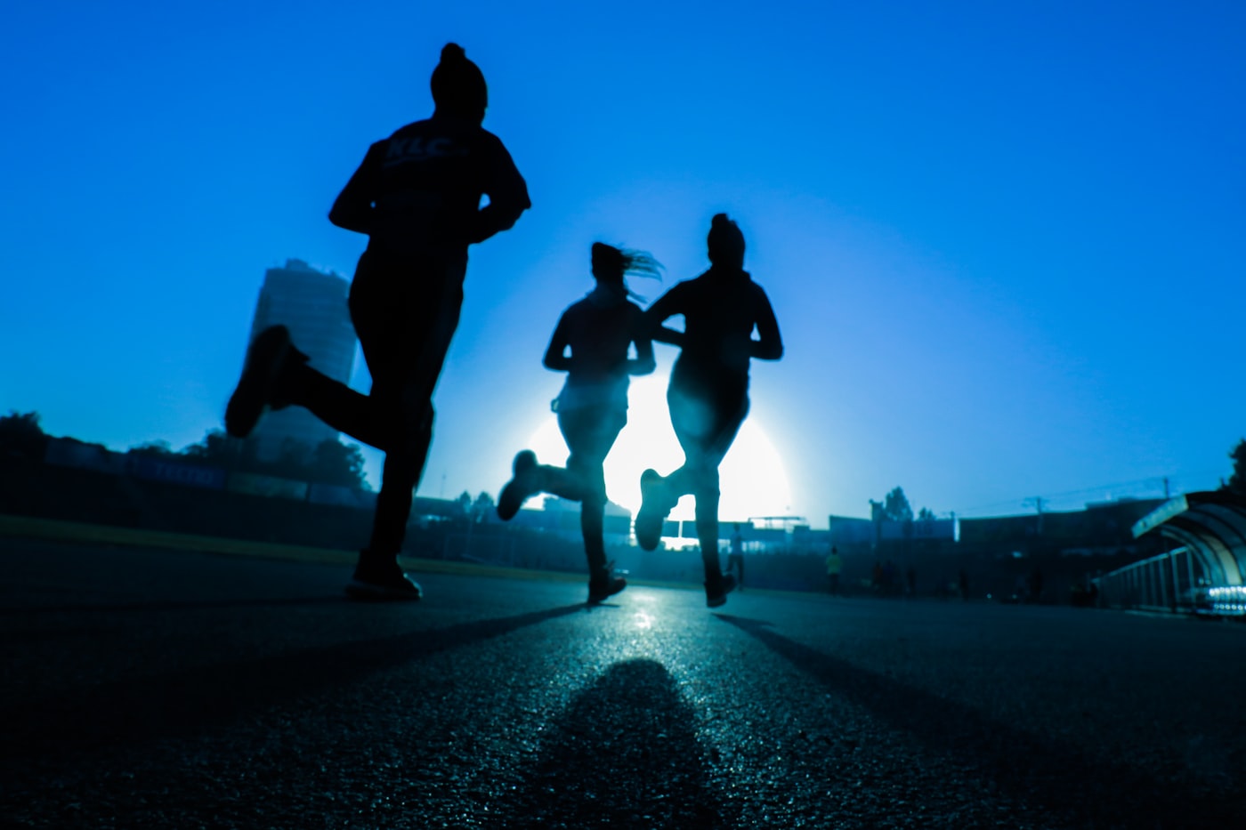 Runners at sunrise